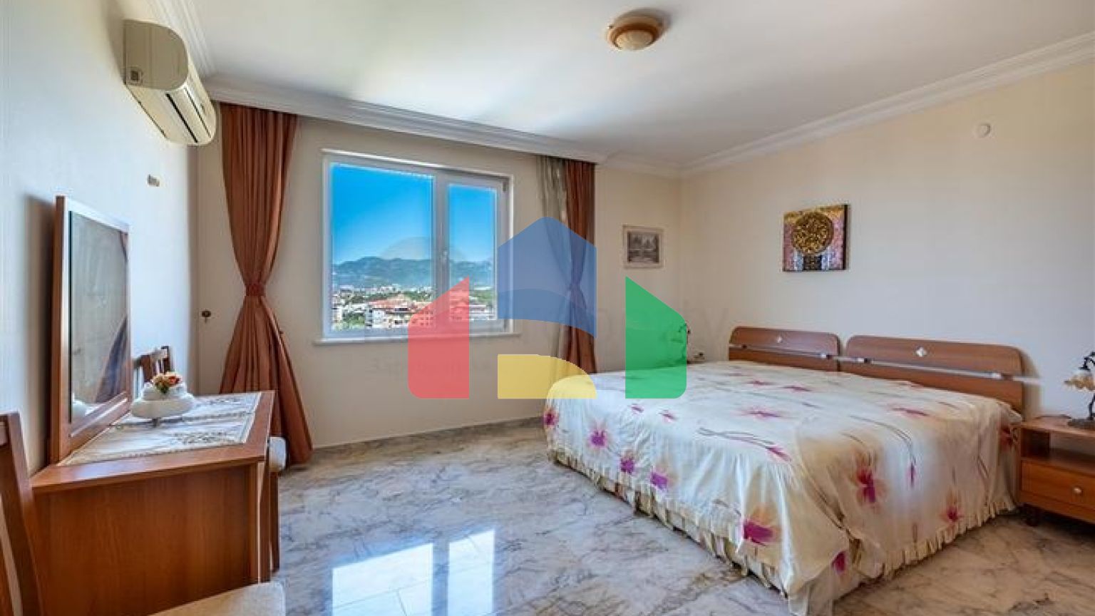 Двухкомнатная квартира с удобной планировкой в районе Махмутлар