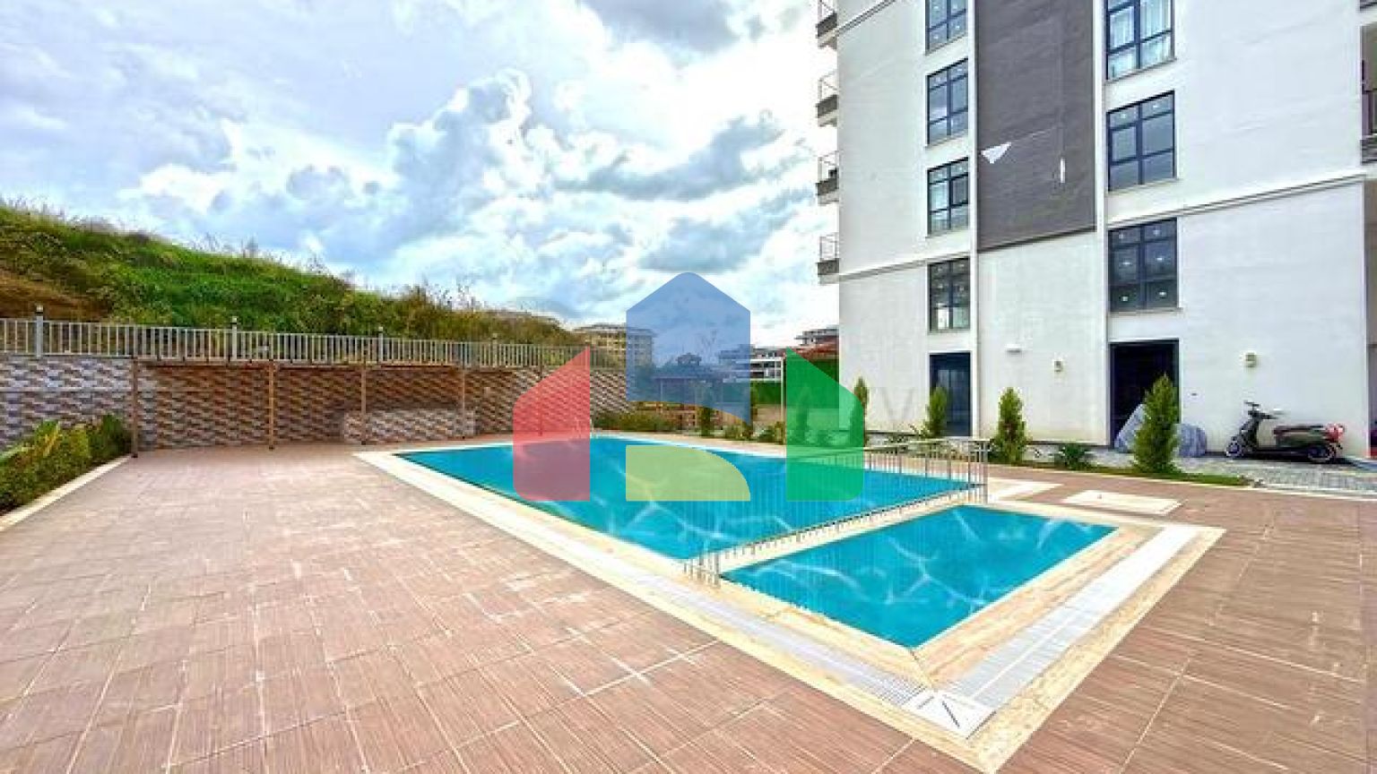 Уютная квартира 1+1 в районе Махмутлар в новом доме