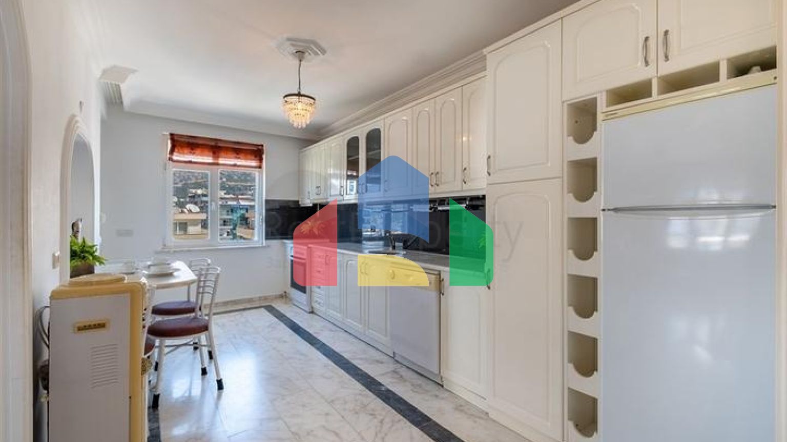 Двухкомнатная квартира с развитой инфраструктурой в районе Махмутлар