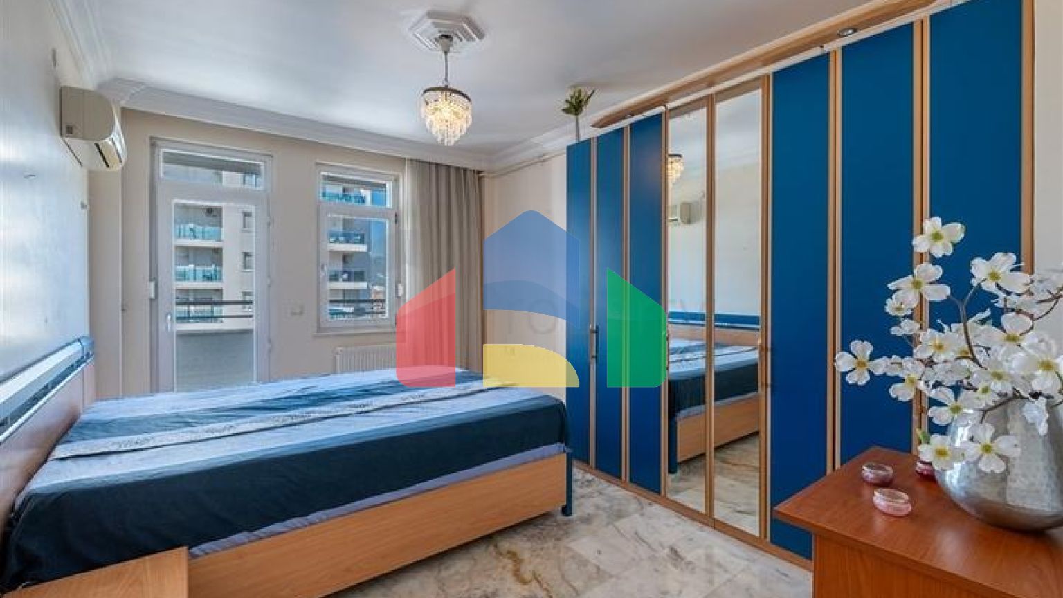 Двухкомнатная квартира с развитой инфраструктурой в районе Махмутлар