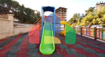 Двокімнатна квартира 1 + 1 в зеленій частині району Авсаллар з багатою інфраструктурою