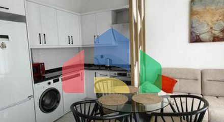 Двокімнатна квартира 1 + 1 в зеленій частині району Авсаллар з багатою інфраструктурою