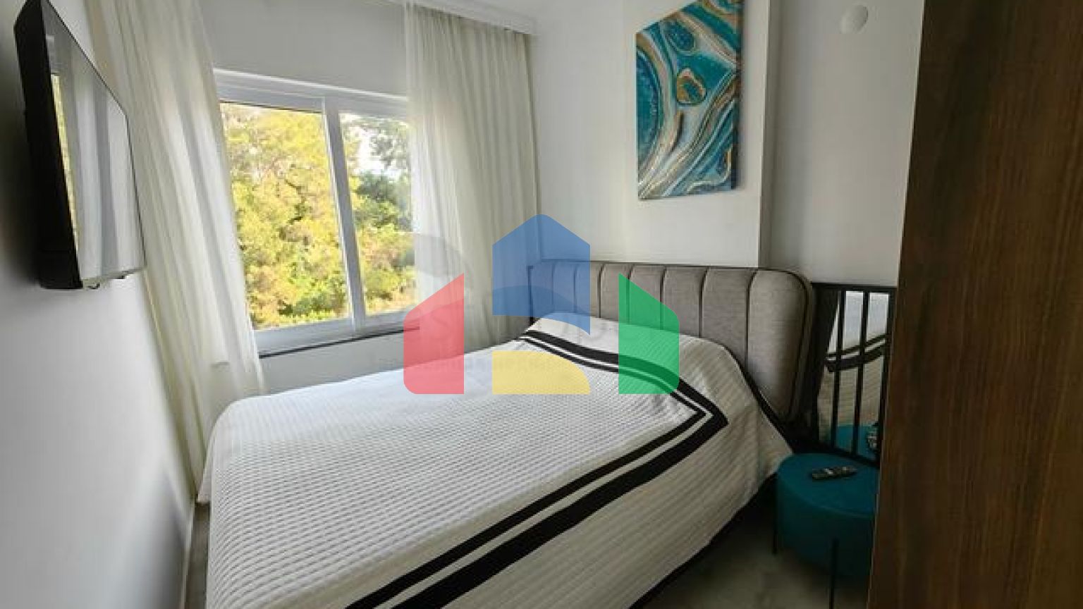 Двокімнатна квартира 1 + 1 в зеленій частині району Авсаллар з багатою інфраструктурою