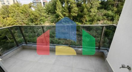 Двокімнатна квартира 1 + 1 в зеленій частині району Авсаллар з багатою інфраструктурою