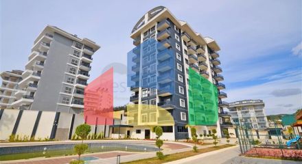 Однокомнатная квартира 1+1 в современном жилом доме района Авсаллар