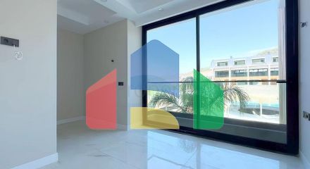 Modern duplex 2+1 with garden in a complex by the sea