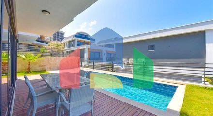 Вилла 4+1 с современным дизайном в живописном районе Каргыджак