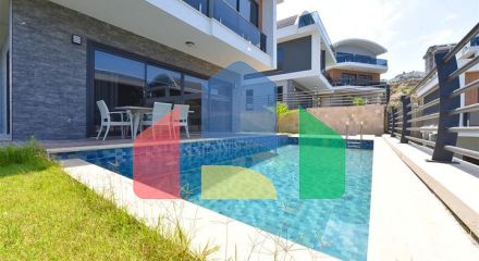 Вилла 4+1 с современным дизайном в живописном районе Каргыджак