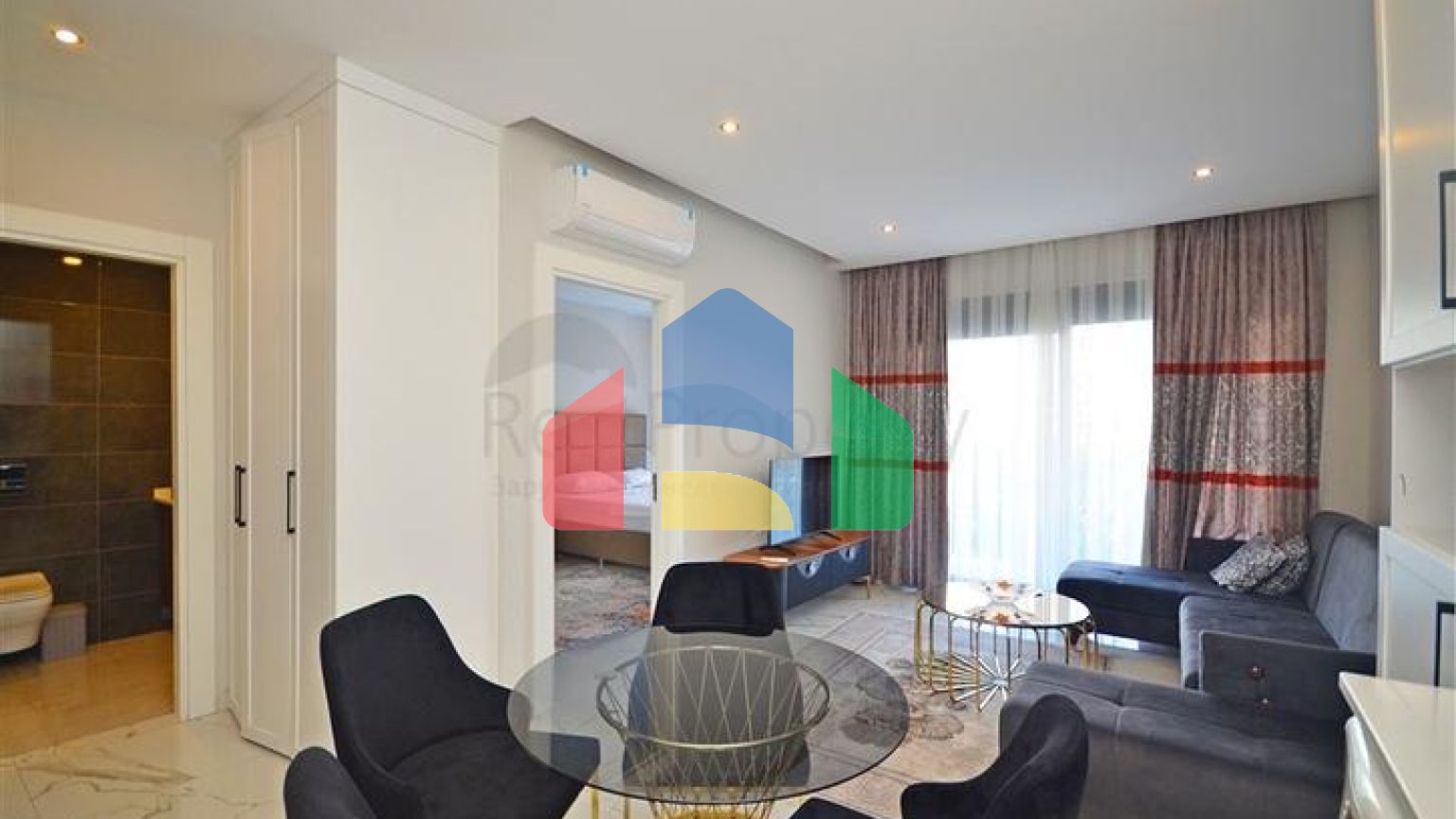 Двухкомнатная квартира в живописном районе Алании и пешей доступности к морю