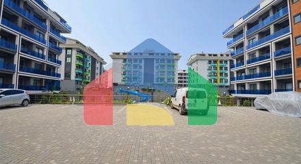 Двухкомнатная квартира в живописном районе Алании и пешей доступности к морю