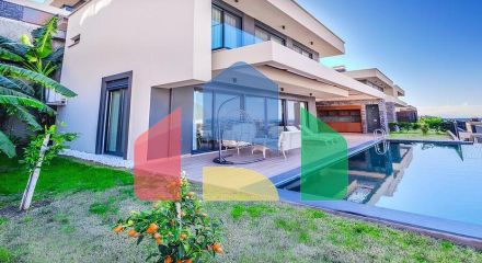 Сучасна вілла 3+1 з терасою і розвиненою інфраструктурою в районі Каргиджак