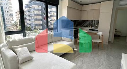 Сучасна квартира 1 + 1 біля моря в районі Тосмур Сучасна квартира 1 + 1 біля моря в районі Тосмур