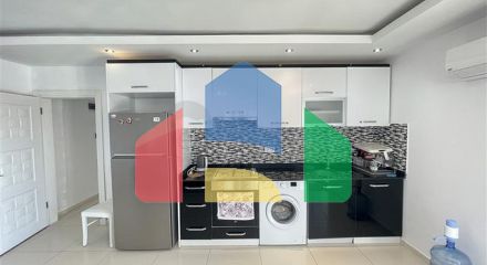 Spacious two-bedroom apartment with a large balcony and sea view