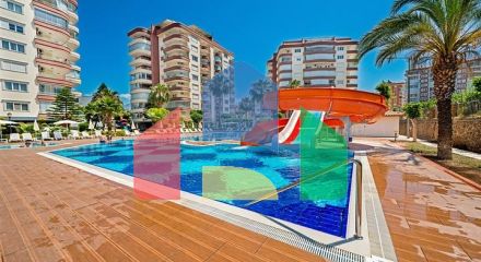 Просторий пентхаус 3 + 2 з терасою в облаштованому житловому комплексі району Тосмур