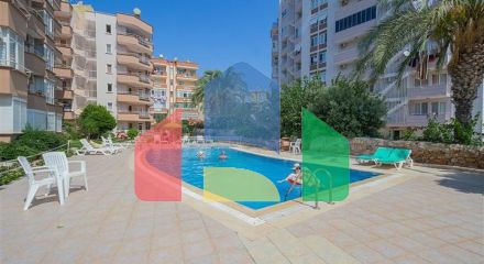 Светлая квартира 2+1 в шаге от моря в районе Тосмур Светлая квартира 2+1 в шаге от моря в районе Тосмур