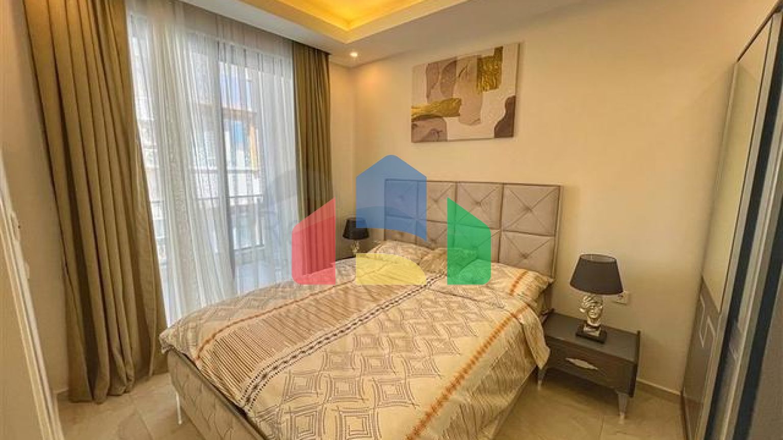 Двухкомнатная квартира 1+1 в современном доме района Оба