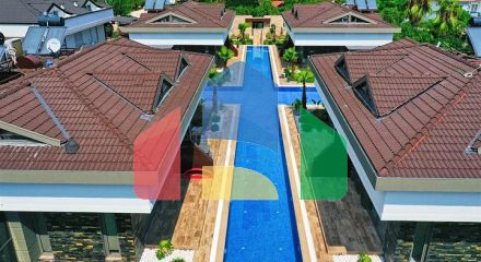 Таунхаус  планировки 3+1 в районе Кемер - Анталия