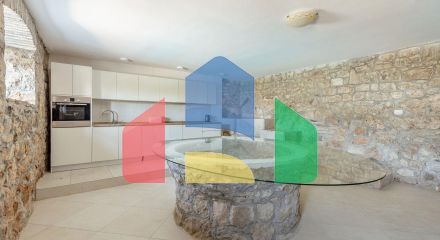 Qualitatively restored stone house with a swimming pool and panoramic views of the bay in Zabrje, Lustica peninsula