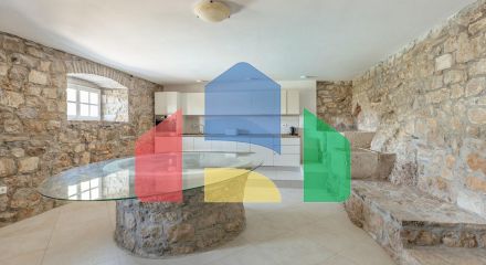 Qualitatively restored stone house with a swimming pool and panoramic views of the bay in Zabrje, Lustica peninsula