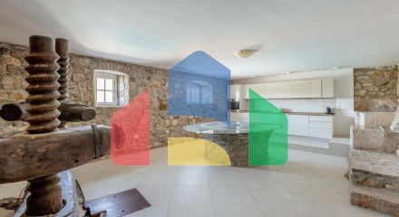 Qualitatively restored stone house with a swimming pool and panoramic views of the bay in Zabrje, Lustica peninsula
