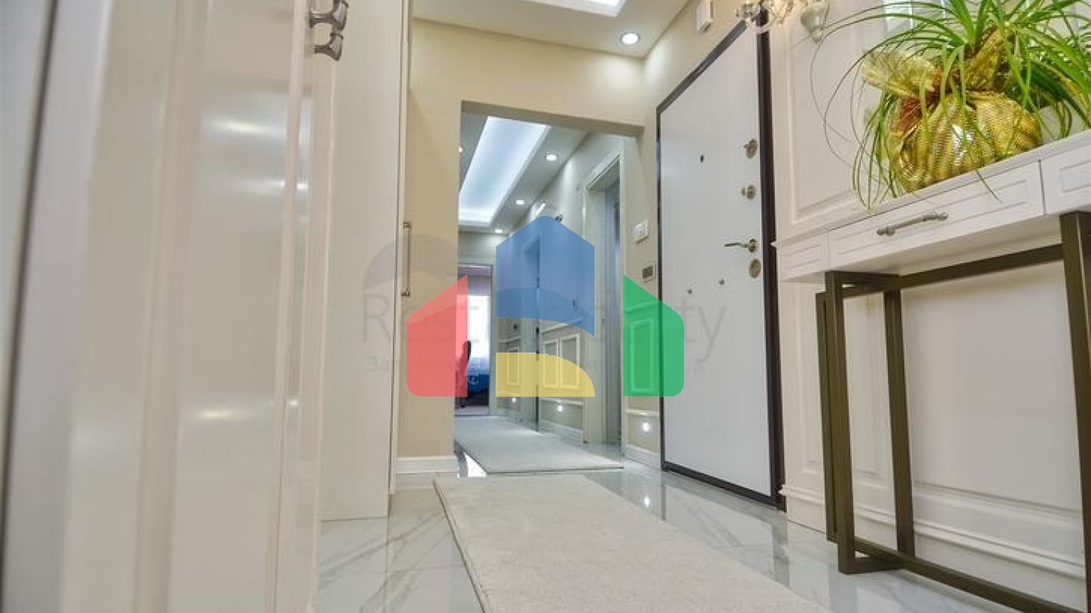 Квартира з меблями планування 3 + 1 в центрі міста Анталія