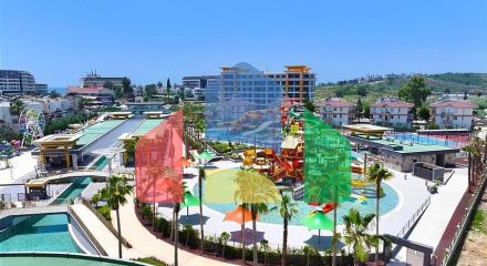 Двухкомнатный садовый дуплекс 2+1 с собственной террасой в районе Тюрклер Двухкомнатный садовый дуплекс 2+1 с собственной террасой в районе Тюрклер