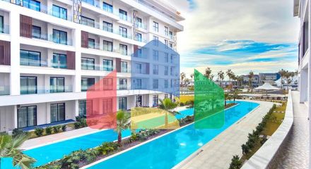 Двухкомнатный садовый дуплекс 2+1 с собственной террасой в районе Тюрклер Двухкомнатный садовый дуплекс 2+1 с собственной террасой в районе Тюрклер