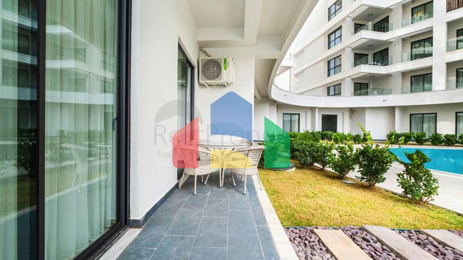 Двухкомнатный садовый дуплекс 2+1 с собственной террасой в районе Тюрклер