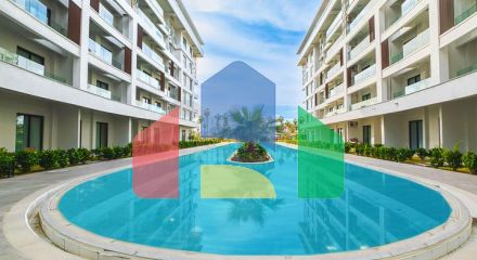 Двухкомнатный садовый дуплекс 2+1 с собственной террасой в районе Тюрклер Двухкомнатный садовый дуплекс 2+1 с собственной террасой в районе Тюрклер