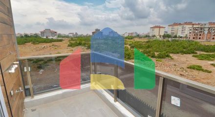 A building with 4 apartments in the area of Doshemealti - Antalya